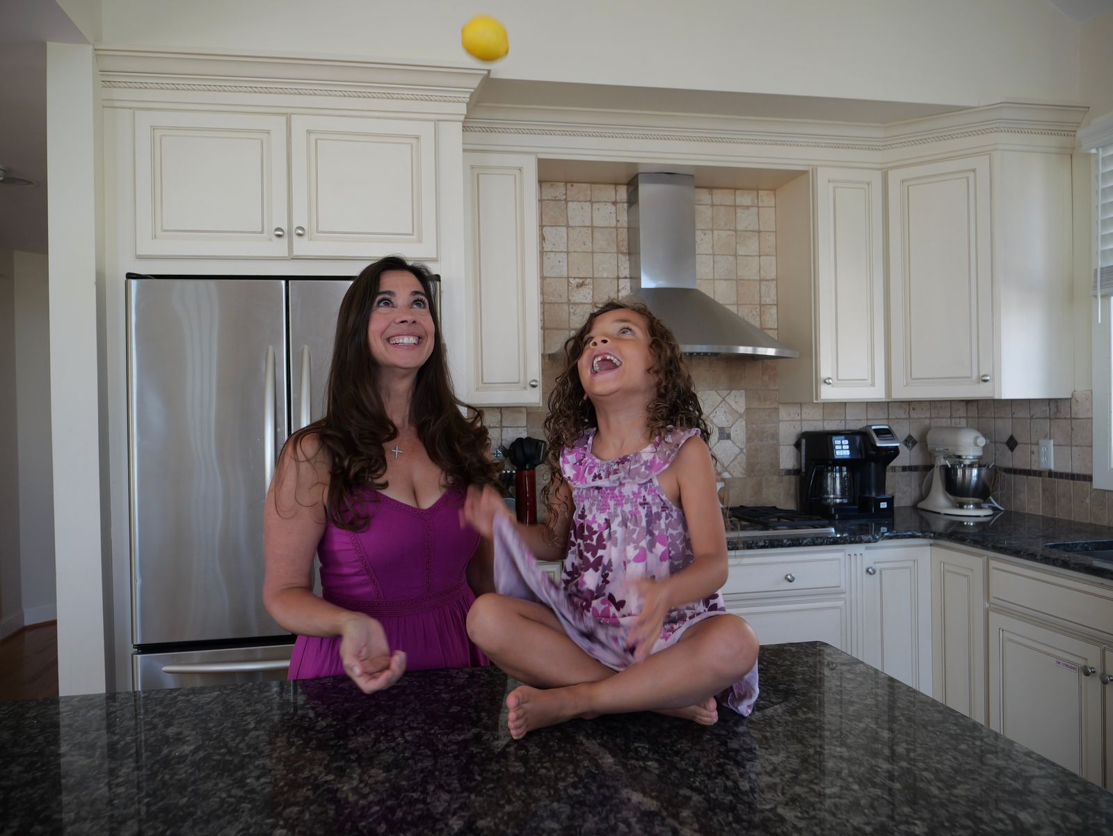 Devin and her daughter cooking together